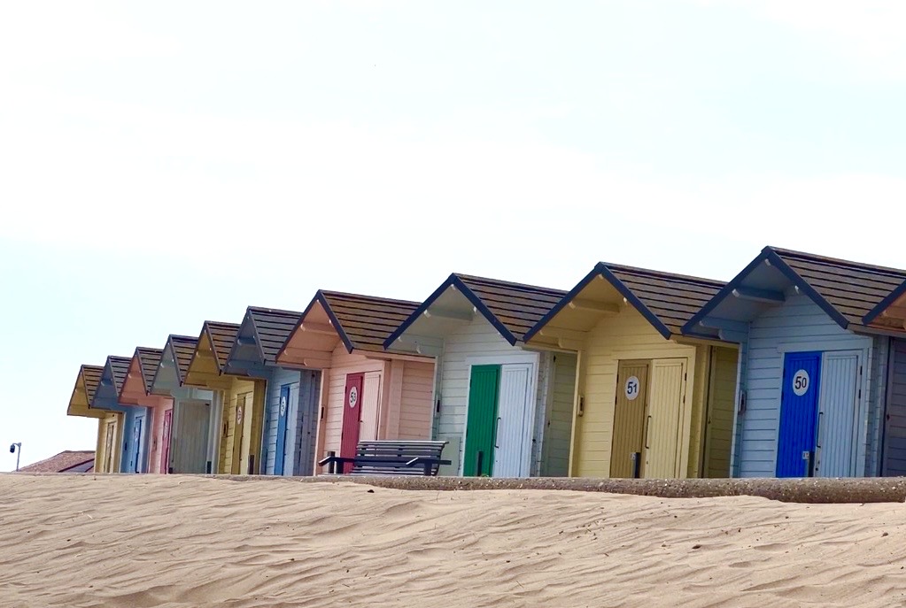 Traditional colourful beach huts in Mablethorpe